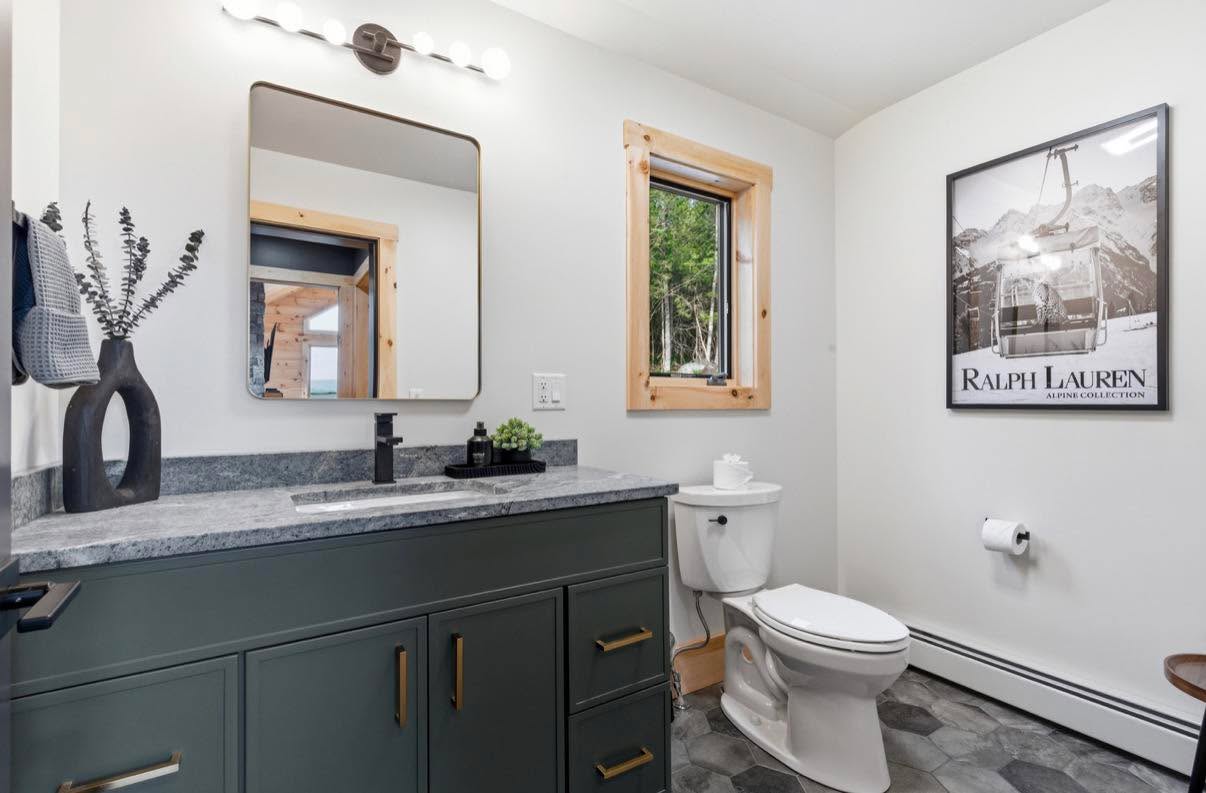 Forest-green vanity, detailed to shine