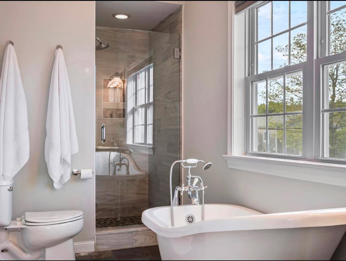 Clawfoot soak with a garden view