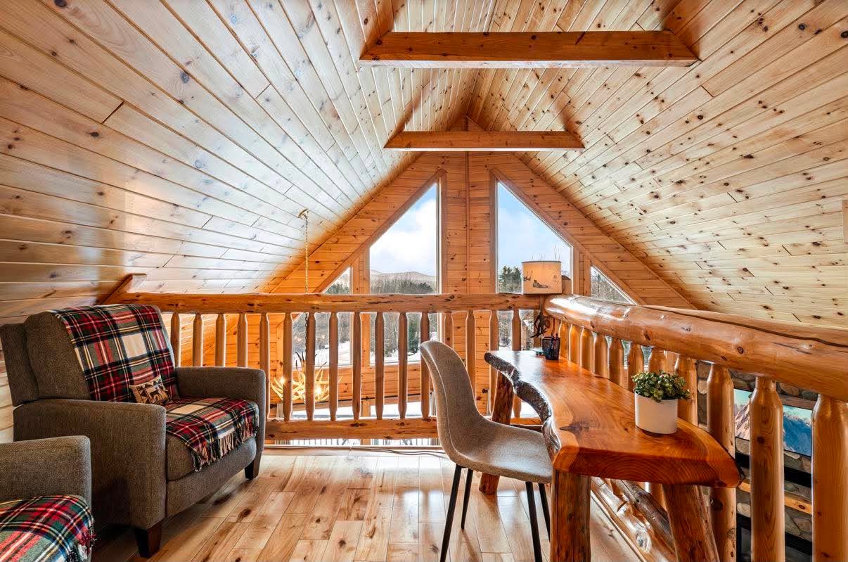 Loft nook with a peak-window view